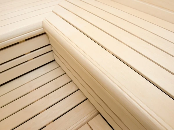 premium innensauna daniel massivholz, innensauna kaufen deutschland, blockbohlen sauna 45 mm, heimsauna polarfichte innenraum, sauna mit glastür innenbereich, massivholz sauna wohnraum